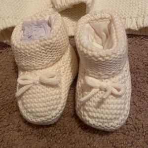 sweater and booties.